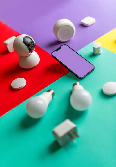 various smart home devices on a colorful surface